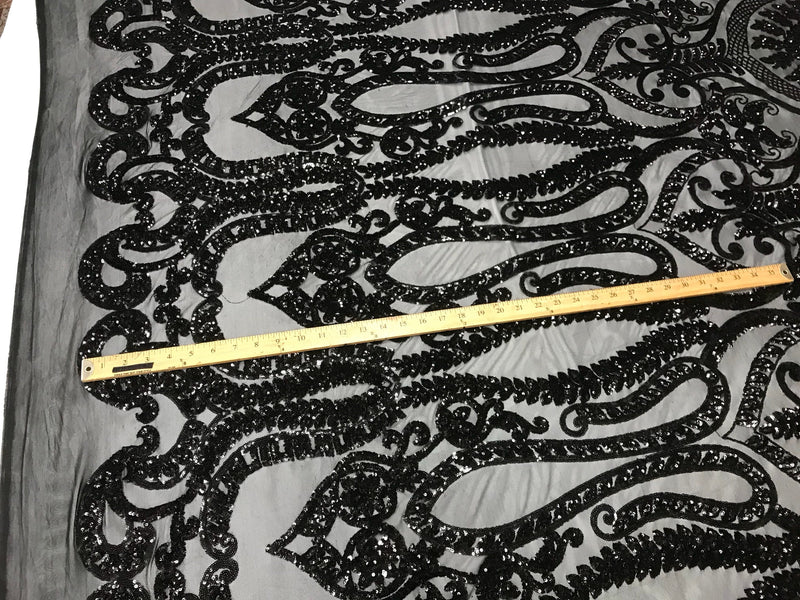 Black diva design embroider with shiny sequins on a 4 way Stretch power mesh-dresses-fashion-apparel-prom-nightgown-sold by the yard.