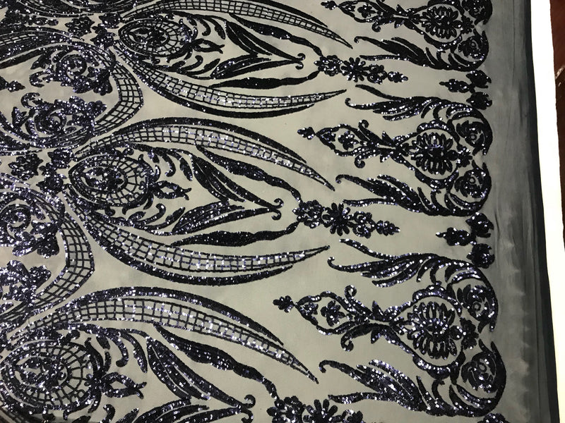 Navy blue princess design embroidery with shiny sequins on a 4 way stretch mesh-sold by the yard.