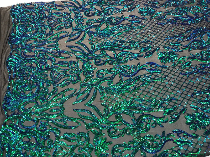 Green iridescent Sequins damask design embroidery on a black 4 way stretch power mesh-sold by yard