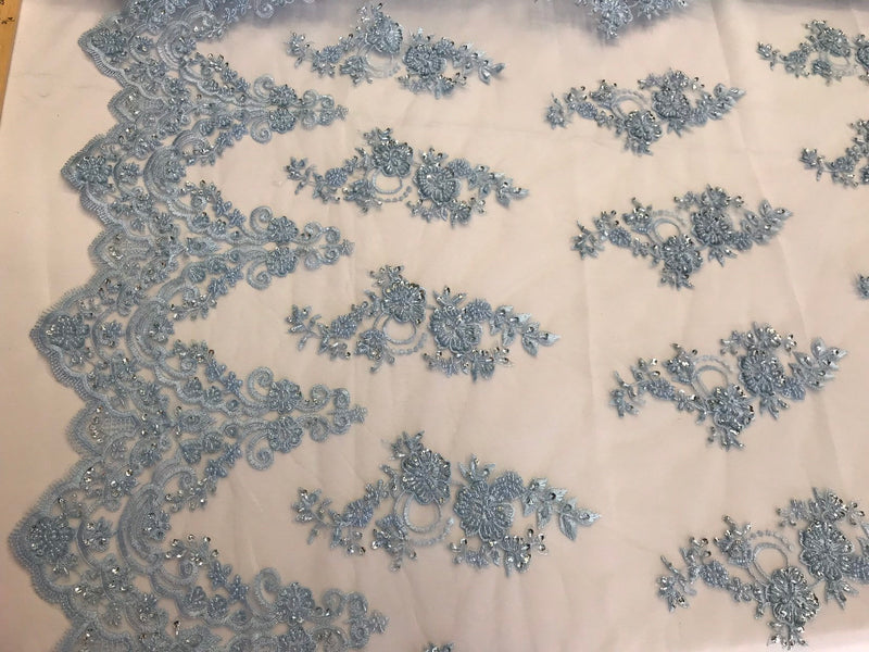 Light blue hand beaded floral design embroidery with shiny sequins on a mesh lace-dresses-fashion-prom-apparel-nightgown-sold by the yard.