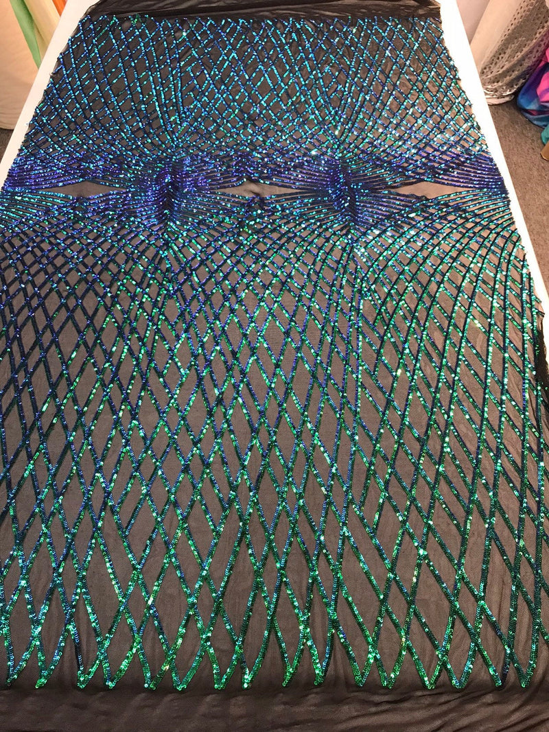 Iridescent green sequin diamond design embroidery on a black 4 way stretch mesh-sold by yard.