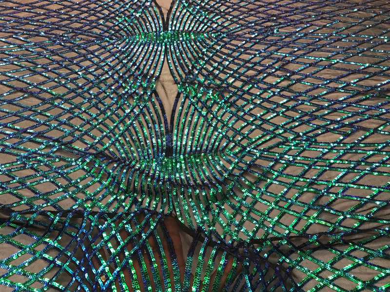 Iridescent green sequin diamond design embroidery on a black 4 way stretch mesh-sold by yard.