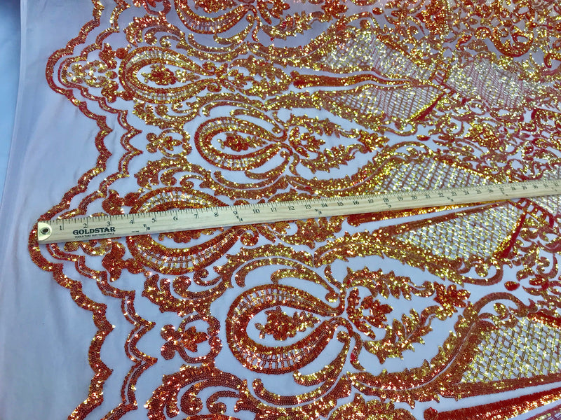 Orange princess design iridescent sequins embroidery on a 4 way stretch nude mesh-dresses-fashion-apparel-nightgown-prom-sold by the yard.