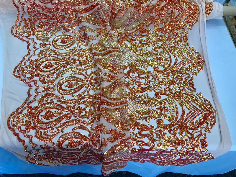 Orange princess design iridescent sequins embroidery on a 4 way stretch nude mesh-dresses-fashion-apparel-nightgown-prom-sold by the yard.