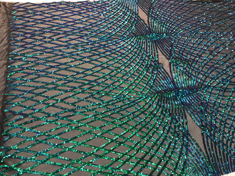 Iridescent green sequin diamond design embroidery on a black 4 way stretch mesh-sold by yard.