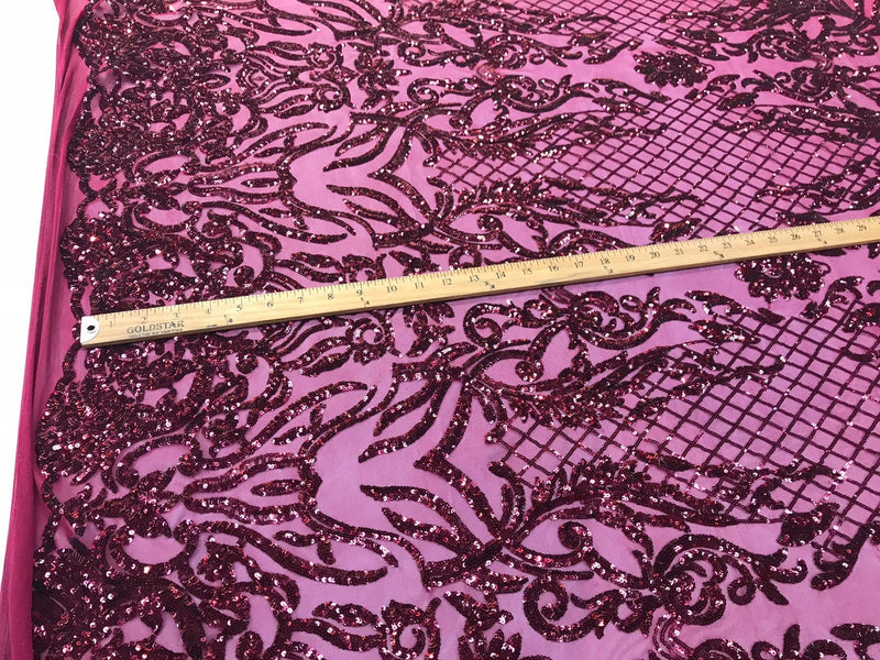 Burgundy shiny sequin damask design on a 4 way stretch mesh-sold by the yard.