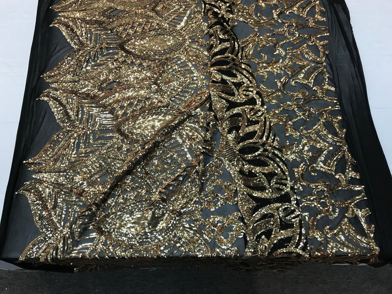 Gold royalty design embroidery sequins on a black 4 way Stretch Mesh -dresses-fashion-apparel-prom-nightgown-sold by the yard.