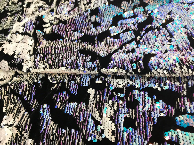 Aqua-white iridescent and reversible sequins embroidery on a 4 way stretch black velvet-dresses-fashion-sold by the yard-free shipping USA.