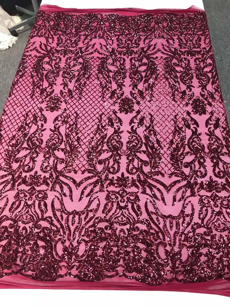 Burgundy shiny sequin damask design on a 4 way stretch mesh-sold by the yard.