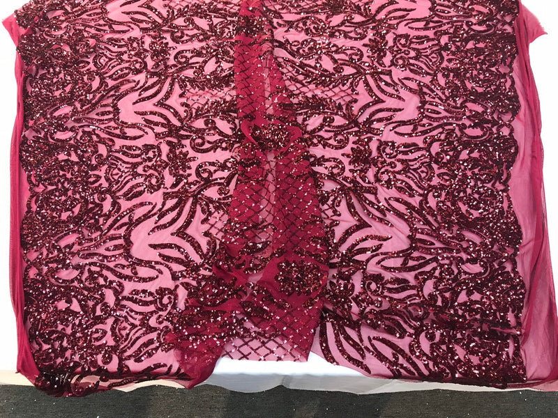 Burgundy shiny sequin damask design on a 4 way stretch mesh-sold by the yard.