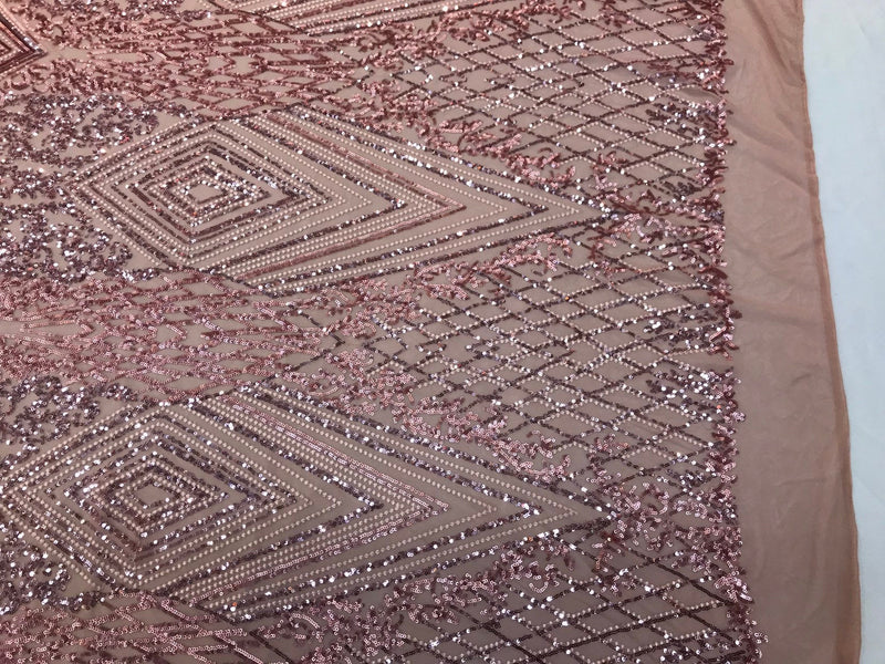 Dusty rose Sequin diamond design embroidery on a 4 way stretch mesh-sold by the yard.