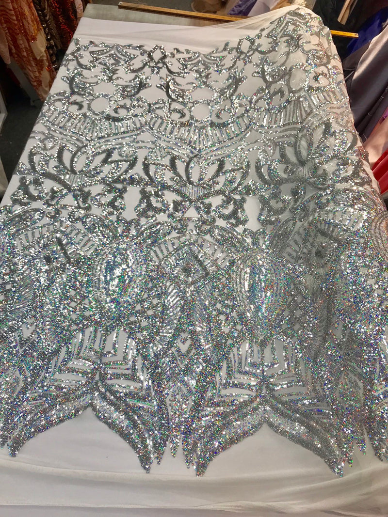 Silver iridescent shiny sequin royalty design embroidery on a 4 way stretch mesh-prom-nightgown-sold by the yard-free shipping in the USA.