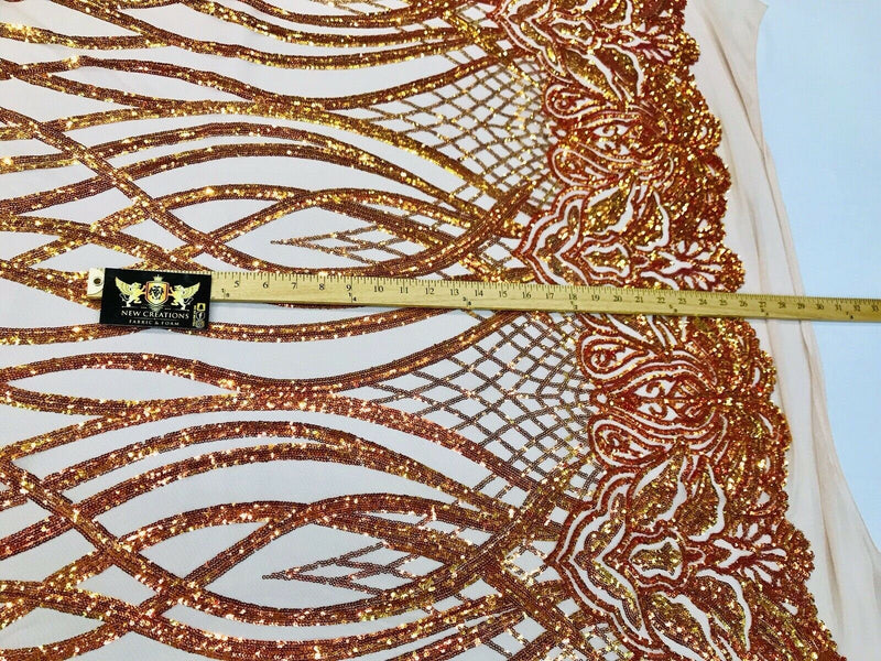 Orange iridescent phoenix flames sequin design on a 4 way stretch nude mesh-prom-nightgown-sold by the yard-free shipping in the USA-