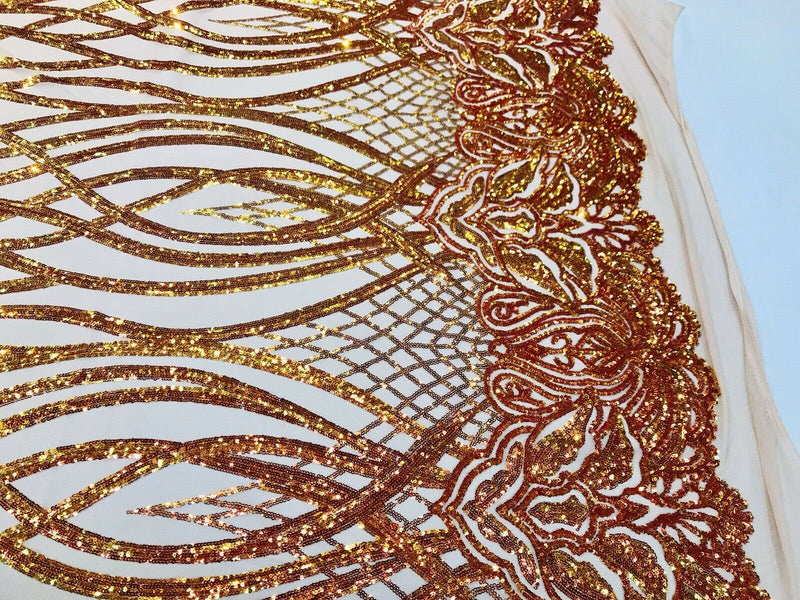 Orange iridescent phoenix flames sequin design on a 4 way stretch nude mesh-prom-nightgown-sold by the yard-free shipping in the USA-