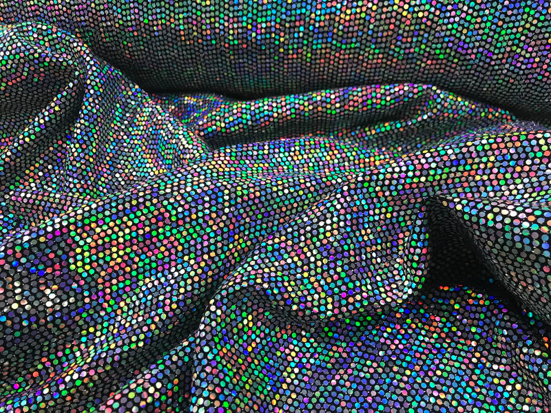 silver iridescent hologram round sequins on a metallic black spandex-sold by the yard-free shipping in the usa.