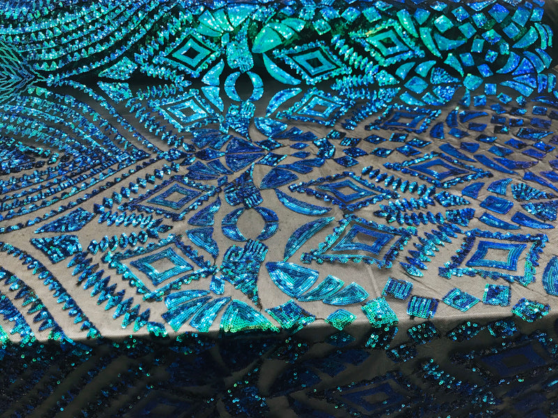 New green/blue iridescent diamond design with sequin on a black 4 way stretch mesh-sold by the yard