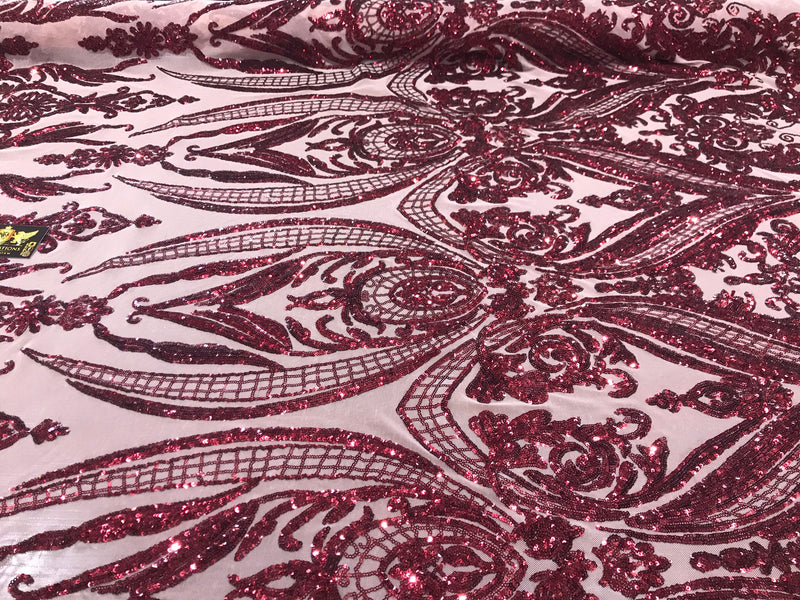 Burgundy big damask sequin design on a nude 4 way stretch mesh-sold by the yard.