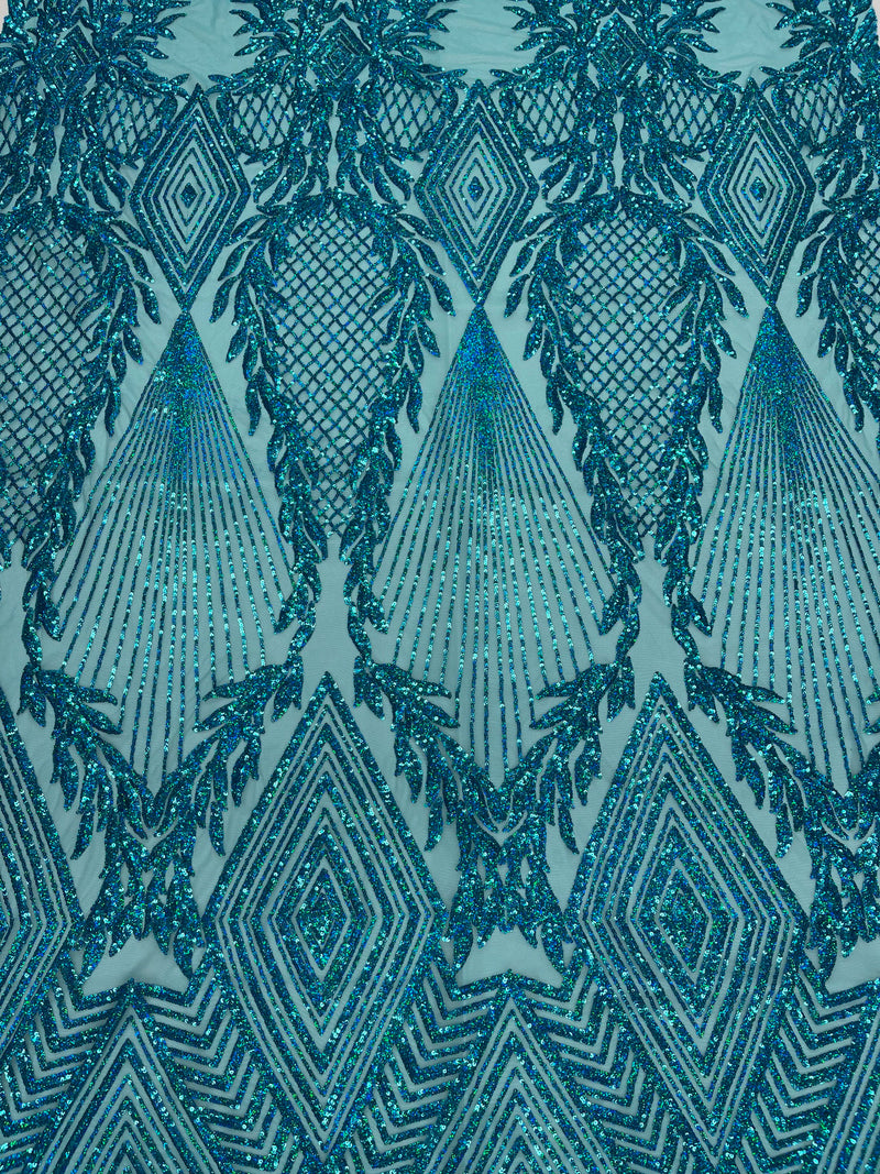 Turquoise diamond design with shiny iridescent sequins on a 4 way stretch mesh-sold by the yard.