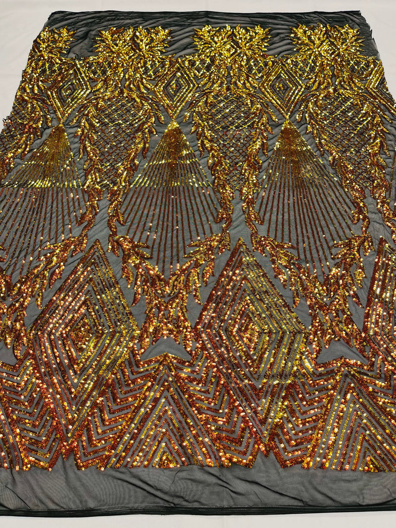 Orange/red diamond design with shiny iridescent sequins on a black 4 way stretch mesh- by the yard.