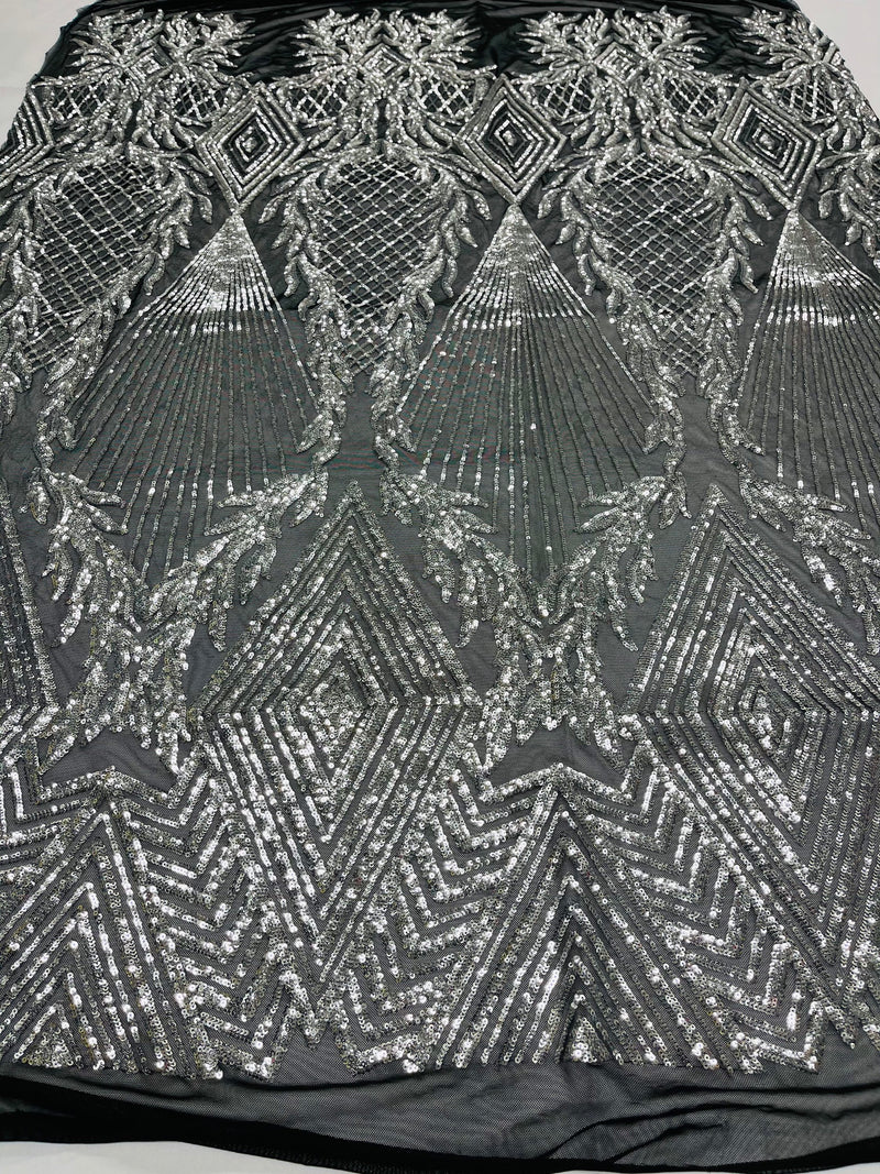 Silver diamond design with shiny iridescent sequins on a black 4 way stretch mesh-sold by the yard-