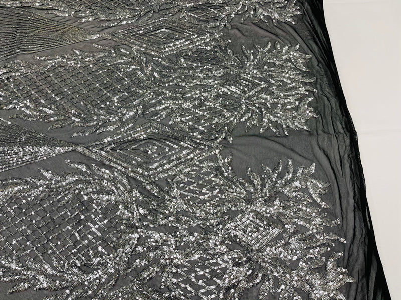 Silver diamond design with shiny iridescent sequins on a black 4 way stretch mesh-sold by the yard-