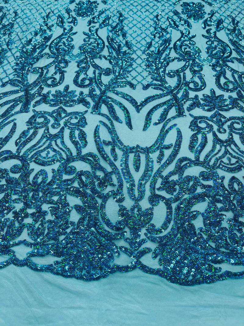 Turquoise iridescent shiny sequin damask design on a 4 way stretch mesh-prom-sold by the yard.