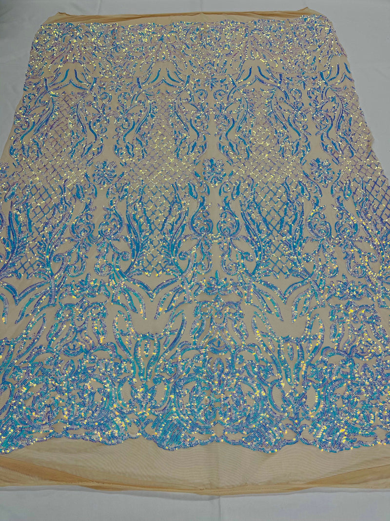 Aqua iridescent shiny sequin damask design on a nude 4 way stretch mesh-prom-sold by the yard.