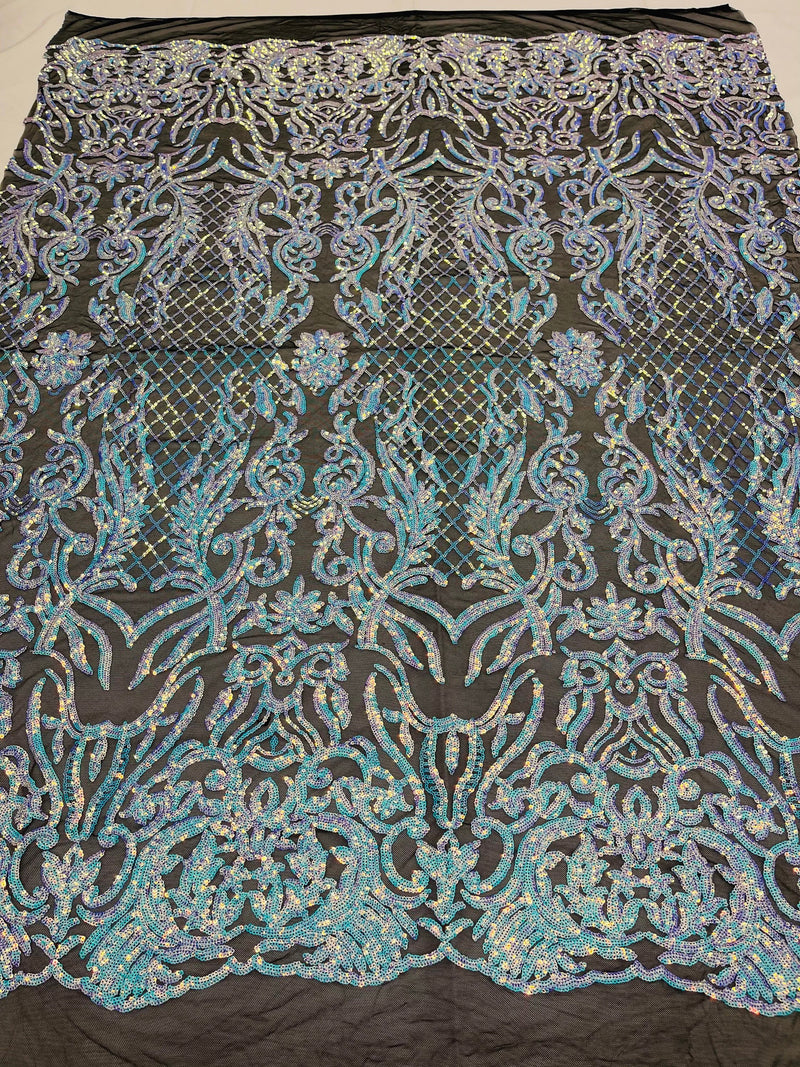 Aqua blue iridescent shiny sequin damask design on a black 4 way stretch mesh-sold by the yard.