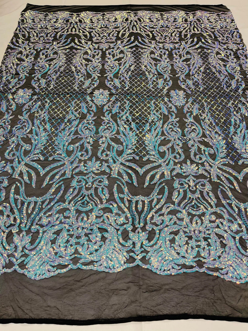 Aqua blue iridescent shiny sequin damask design on a black 4 way stretch mesh-sold by the yard.