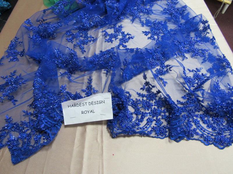 Luxurious royal blue French design embroider and beaded on a mesh lace. Wedding/Bridal/Prom/Nightgown/Dresses/Fashion/Sold by yard.