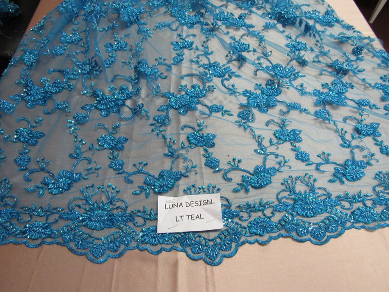 Elegant turquoise French design embroider and beaded on a mesh lace. Wedding/Bridal/Prom/Nightgown fabric.