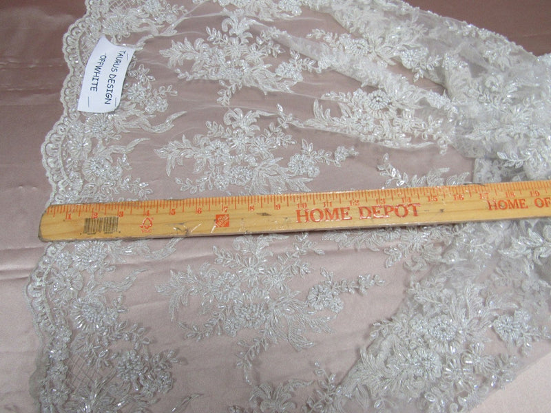 Gorgeous off white French design embroider and beaded on a mesh lace. Wedding/Bridal/Prom/Nightgown/dresses/fashion/sold by the yard.