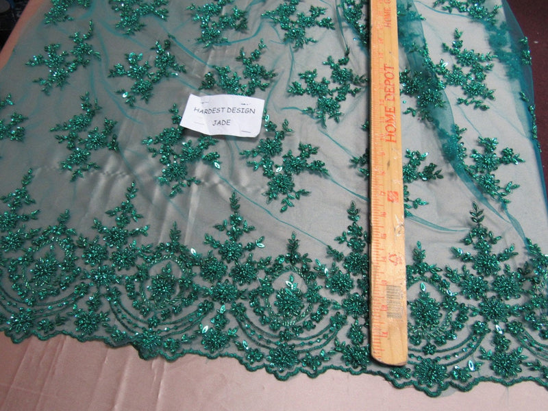 Luxurious jade French design embroider and beaded on a mesh lace. Wedding/bridal/Prom/Nightgown/fashion/dresses/decorations/sold by yard.