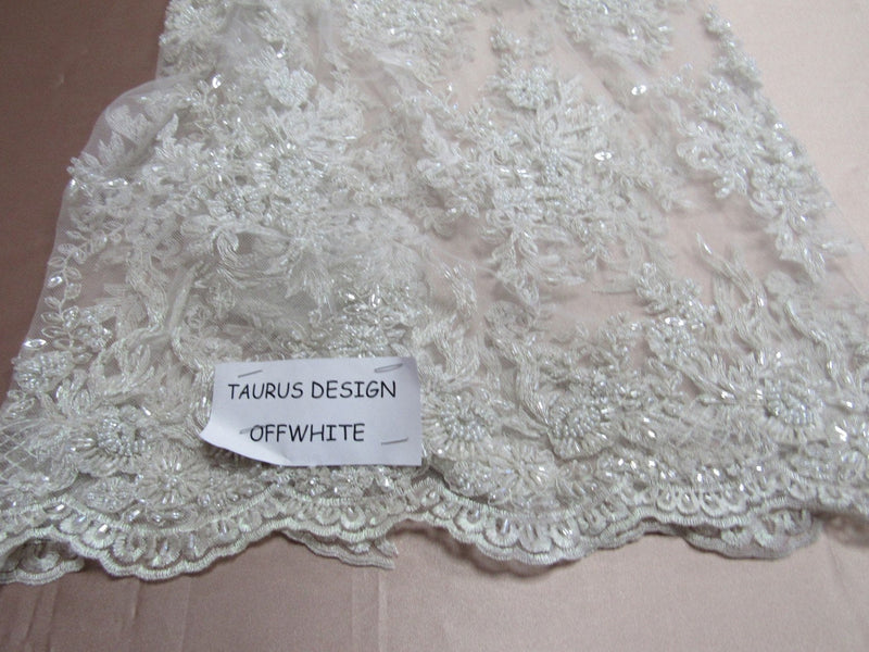 Gorgeous off white French design embroider and beaded on a mesh lace. Wedding/Bridal/Prom/Nightgown/dresses/fashion/sold by the yard.