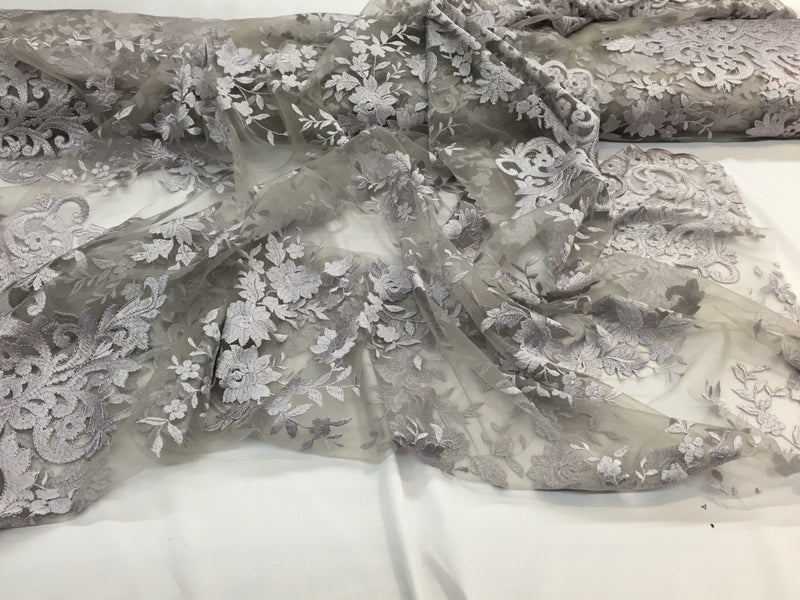 Silver/gray flowers embroider on a 2 way stretch mesh lace. Wedding/Bridal/Prom/Nightgown fabric-apparel-dresses-fashion-Sold by the yard.