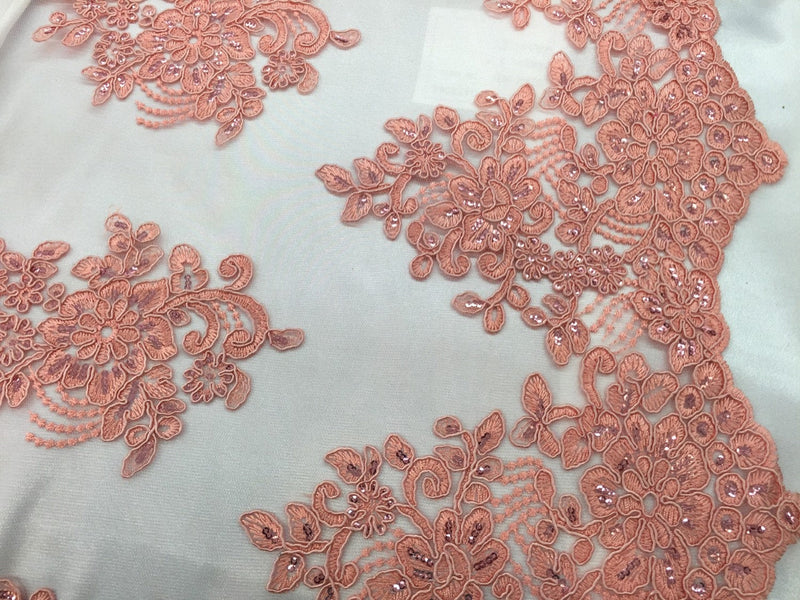 Coral flower lace corded and embroider with sequins on a mesh. Wedding/bridal/prom/nightgown fabric. Sold by the yard.