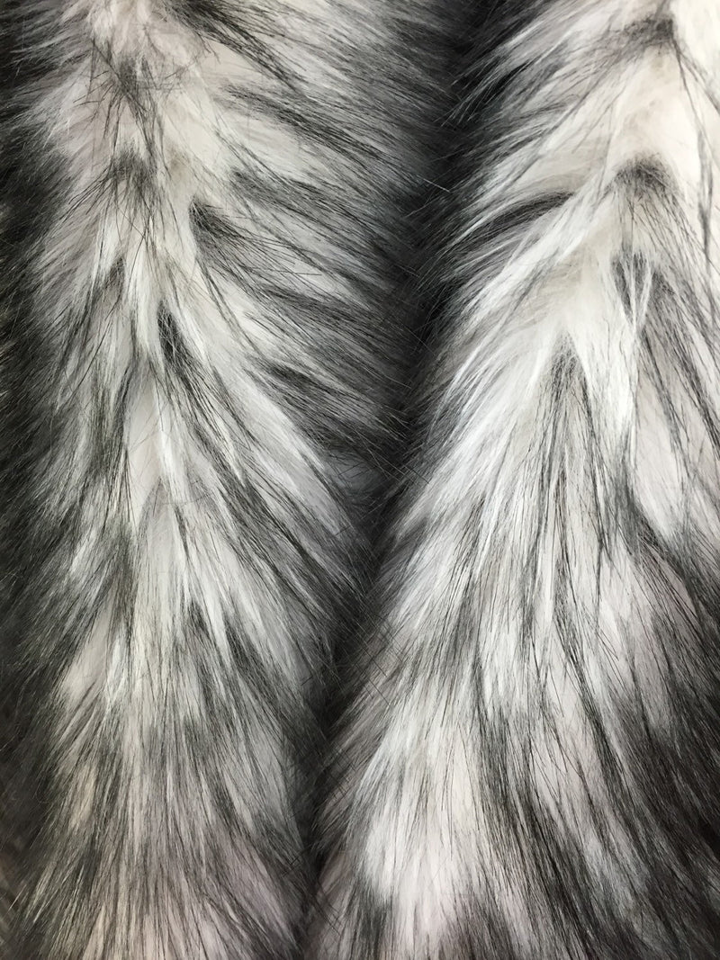 White/black husky faux fur, 2 tone shaggy faux fur. Sold by the yard.60" wide.