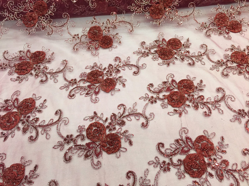 Burgundy 3d flowers embroider with sequins on a mesh lace fabric. Sold by the yard.