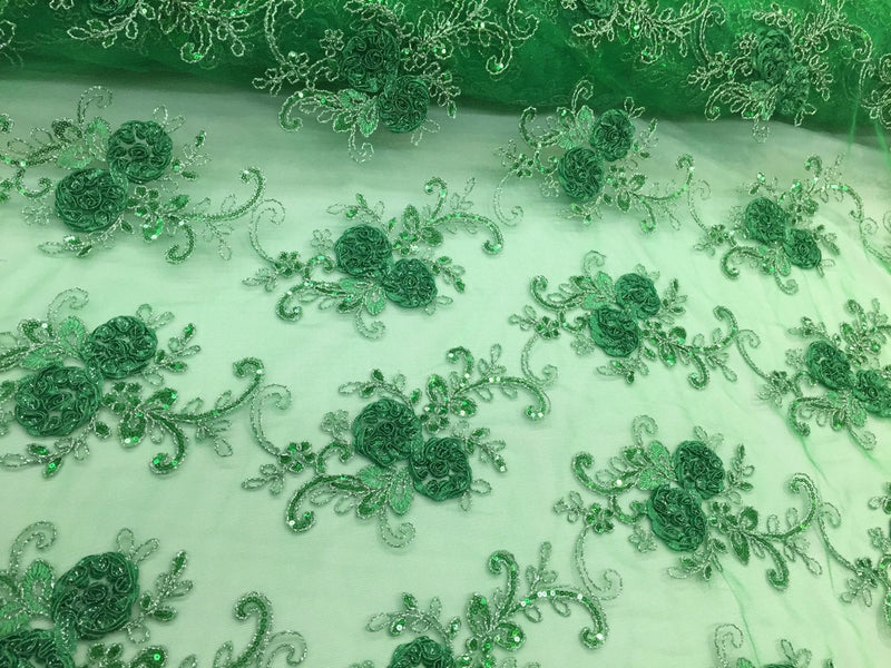 Green  3d flowers embroider with sequins on a mesh lace fabric. Sold by the yard.