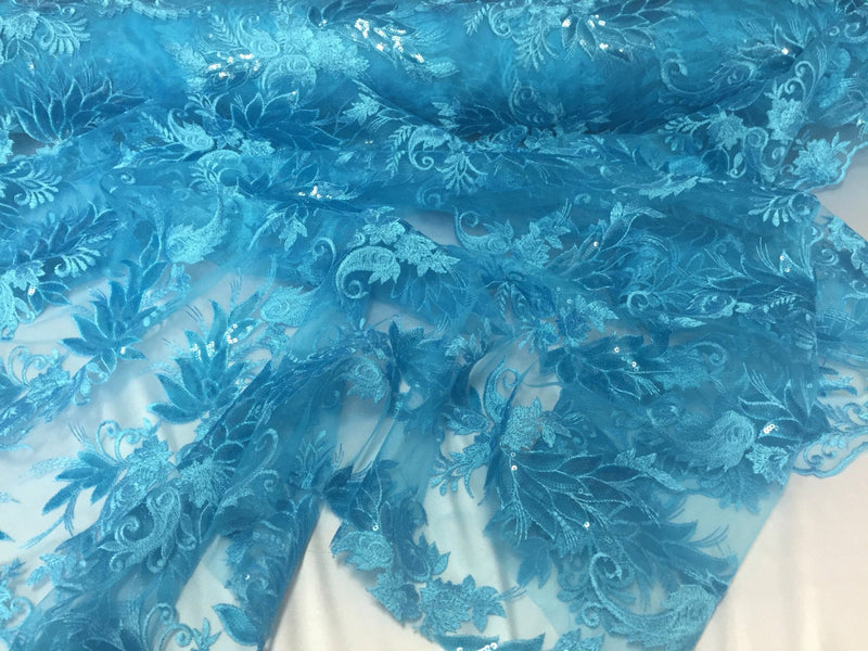Turquoise paisley flowers embroider with sequins on a mesh lace fabric.wedding-bridal-prom-nightgown-dresses-fashion-sold by the yard.