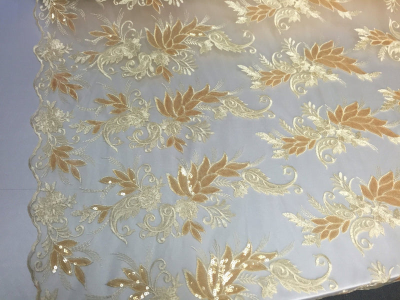 Yellow/gold paisley flowers embroider with sequins on a mesh lace fabric. Wedding-bridal-prom-nightgown fabric- sold by the yard.
