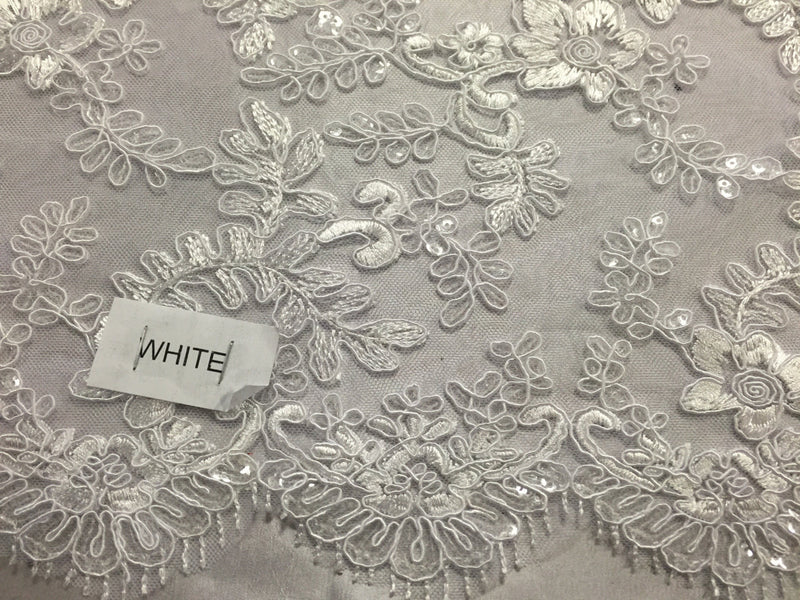 White corded flowers embroider with sequins on mesh lace fabric- yard