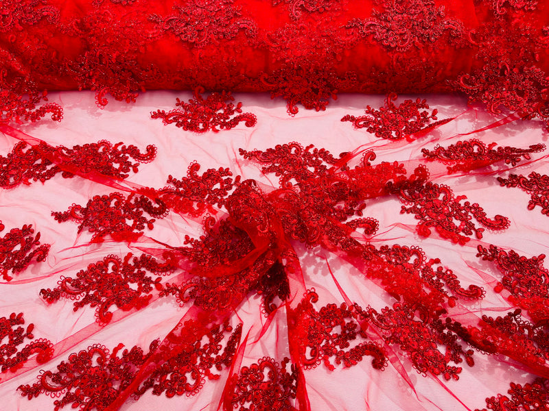 Red metallic floral design embroidery on a mesh lace with sequins and cord-sold by the yard.