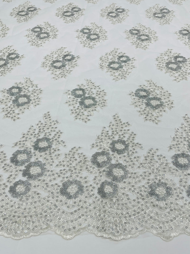 Floral corded embroider with glitter sequins on a mesh lace fabric-sold by the yard