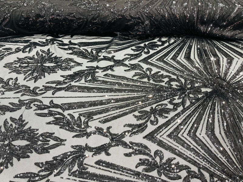 Black sequin damask design on a 4 way stretch mesh- sold by the yard.