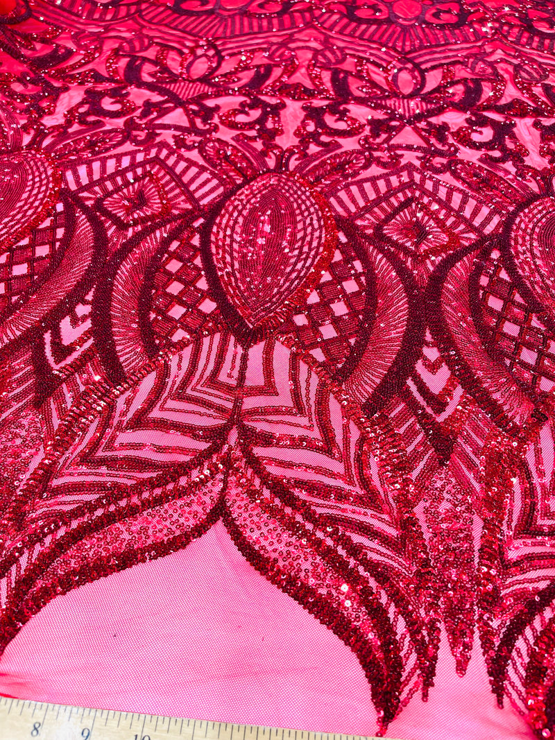 Red royalty design on a 4 way stretch mesh-prom-sold by the yard.
