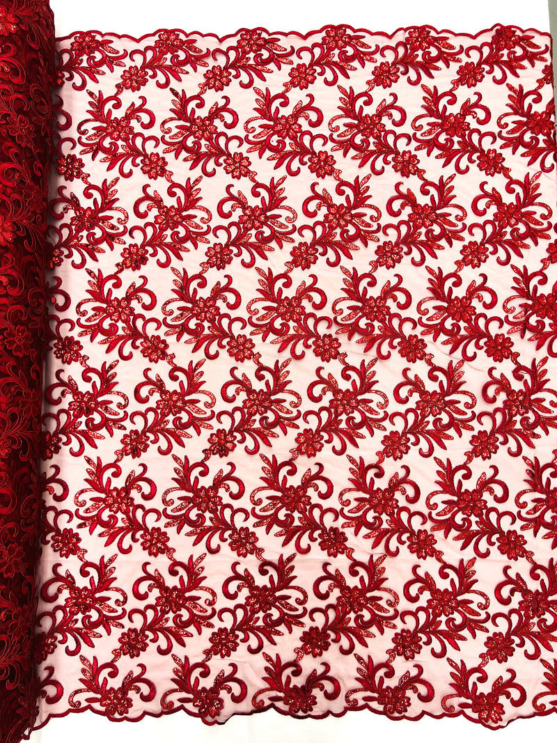 Estrella corded flowers embroider with sequins on a mesh lace fabric-sold by the yard.