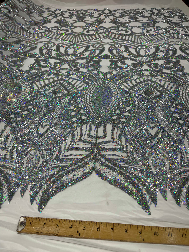 Silver iridescent royalty design on a white 4 way stretch mesh-prom-sold by the yard.