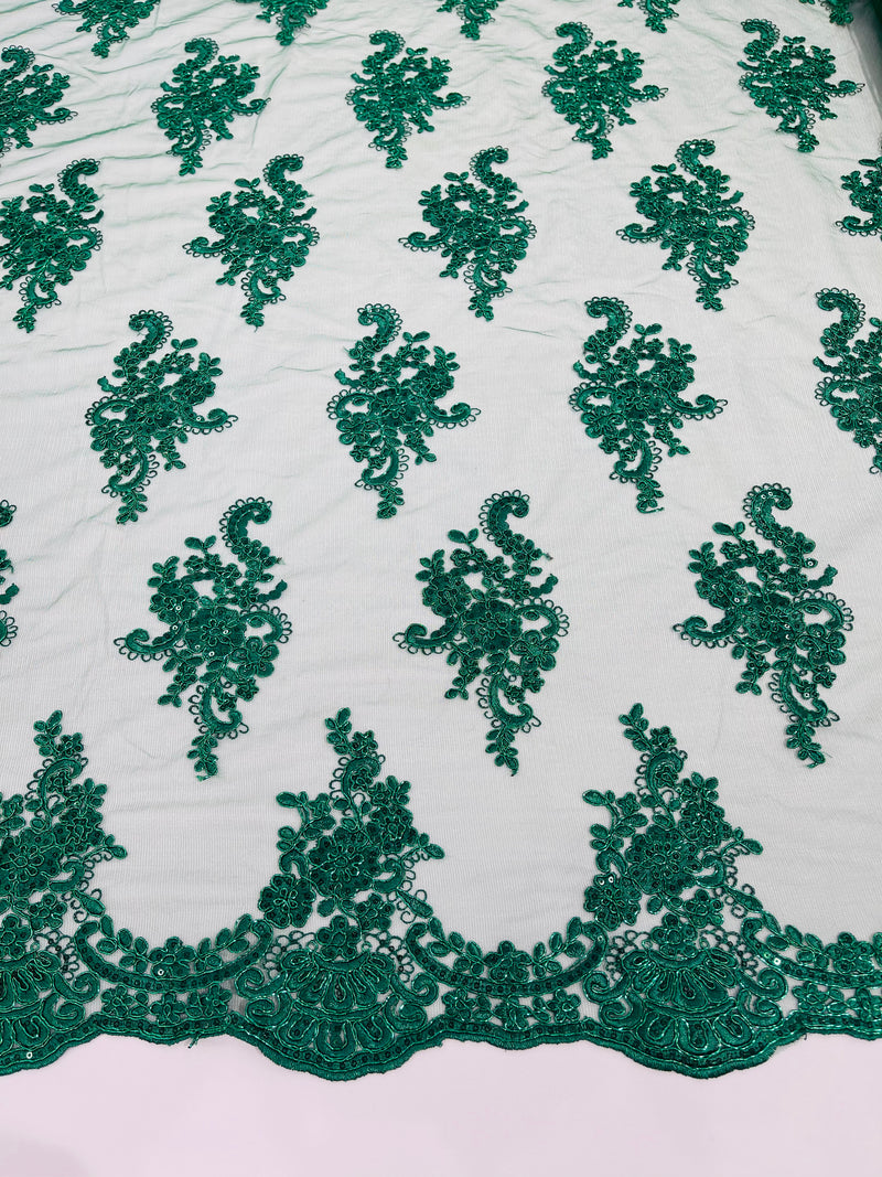 Hunter green metallic floral design embroidery on a mesh lace with sequins and cord-sold by the yard.