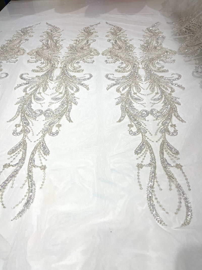 Off White heavy hand beaded design embroider with beads-pearls-sequins on a mesh lace-sold by yard.